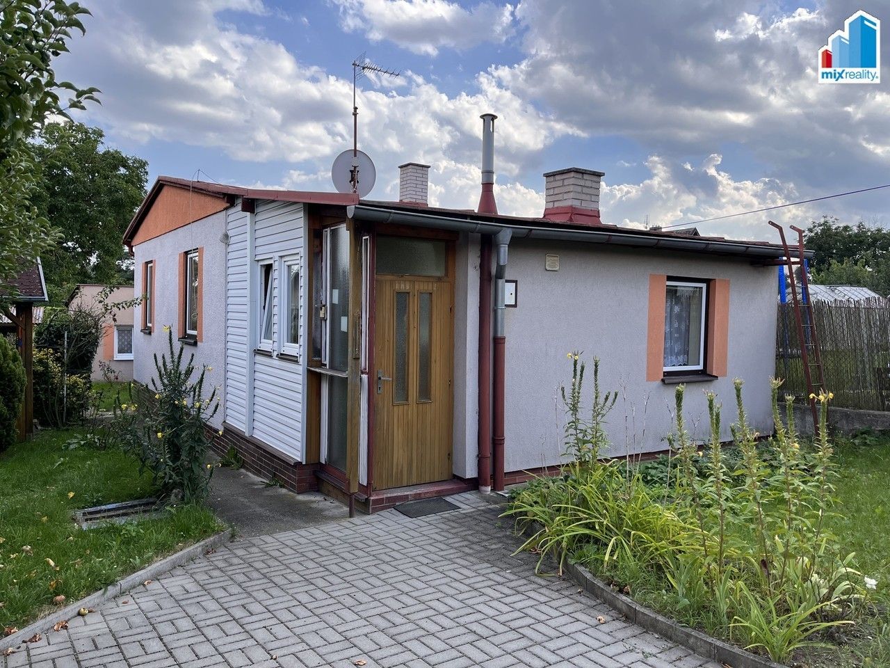 Prodej rodinný dům - Julia Fučíka, Tlučná, 45 m²