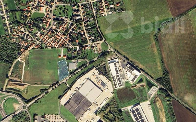 Prodej komerční pozemek - Postřižín