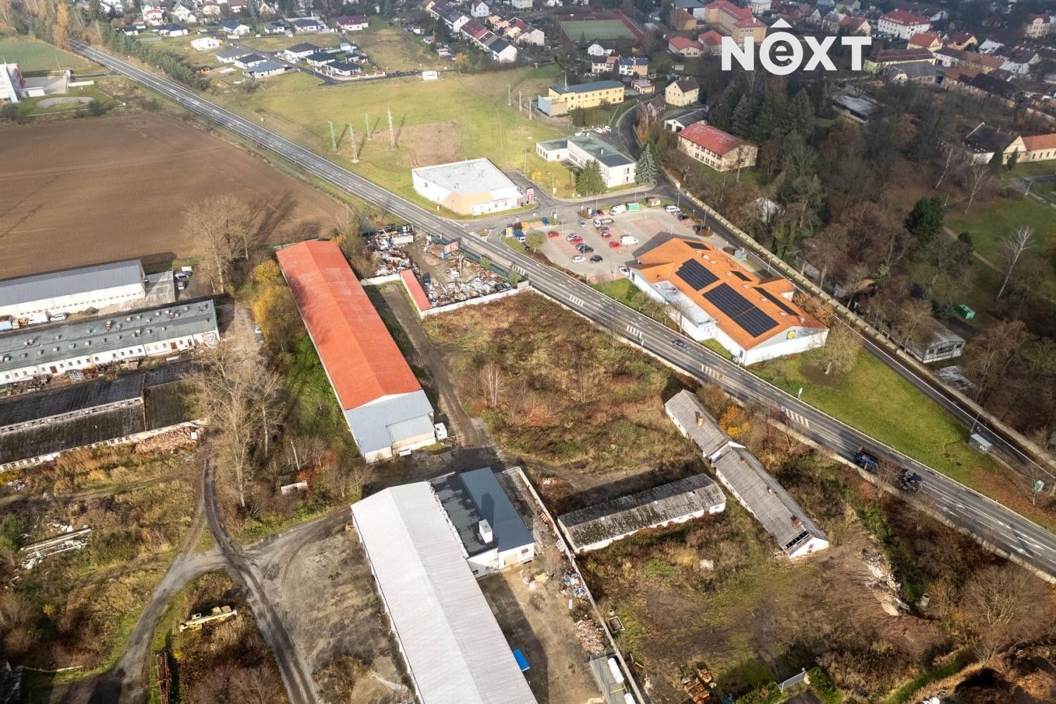 Prodej komerční pozemek - Pražská, Doksy