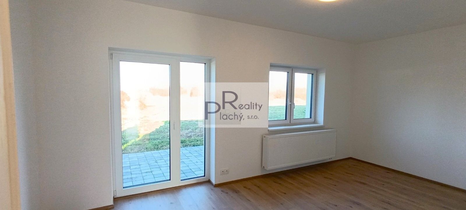 Prodej byt 2+kk - Hevlín, 56 m²