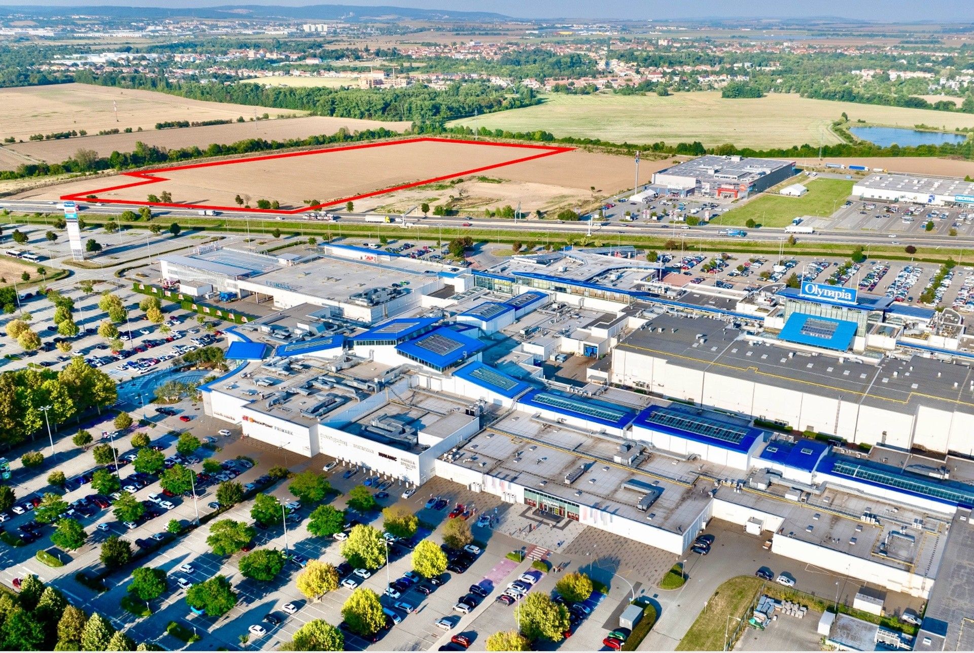 Prodej komerční pozemek - Modřice