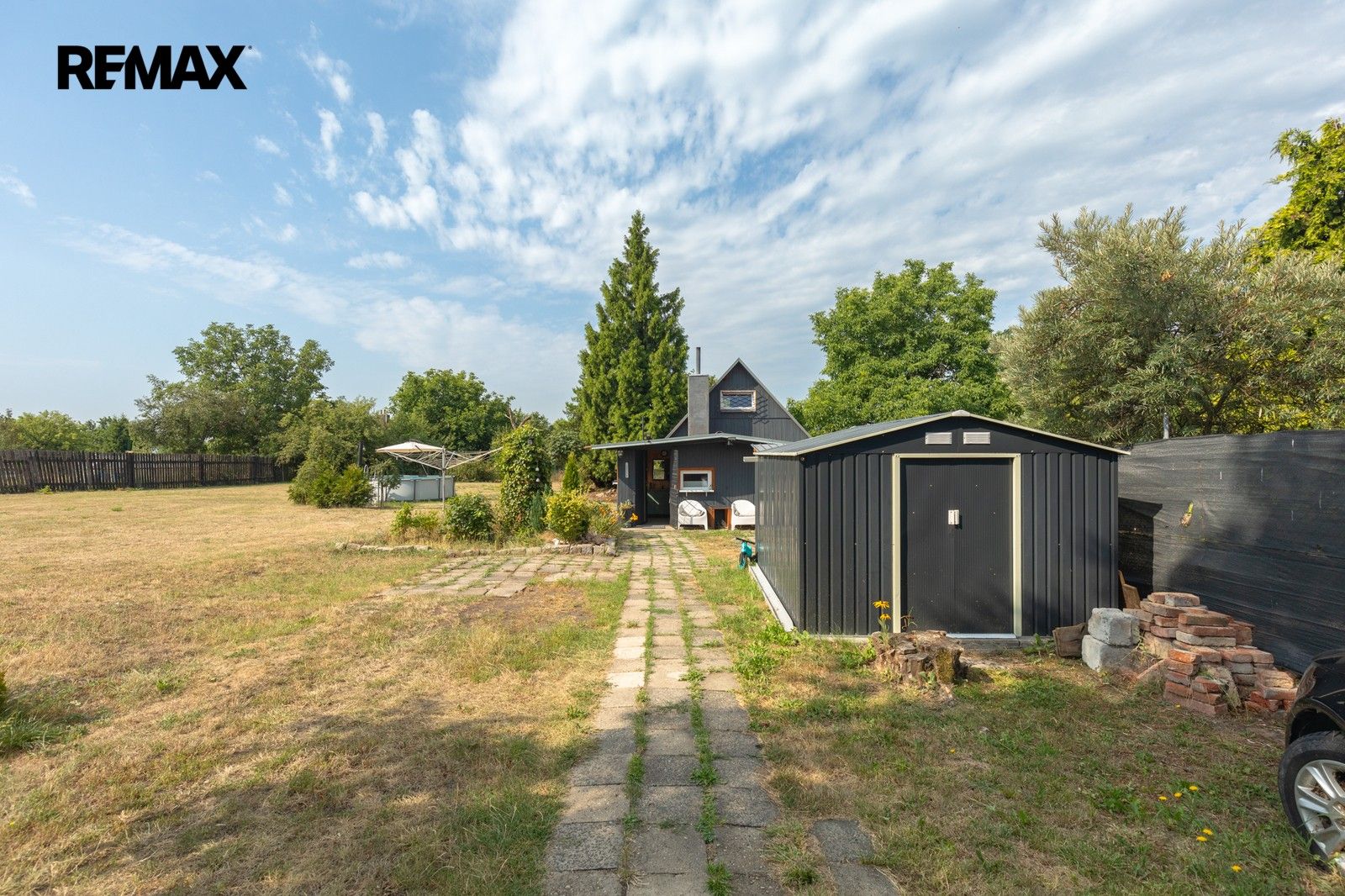 Zahrada · 1 877 m² · Lom - 3